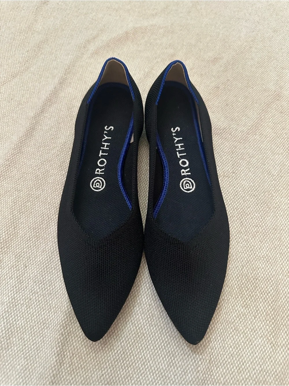 Rothy's Black Pointed Knit Flats with Blue Heel Trim